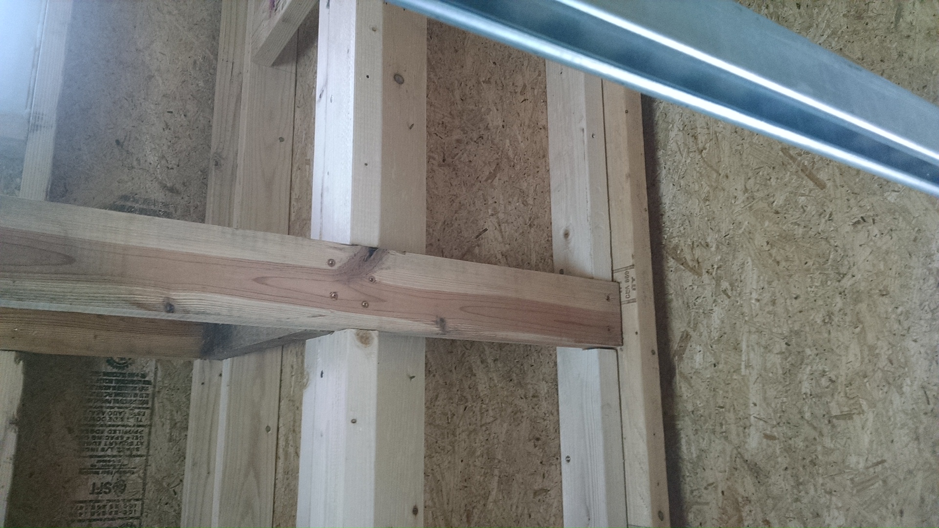 when I framed my tiny house, I inset a ledger at the gable walls to add strength and give support for the future lofts