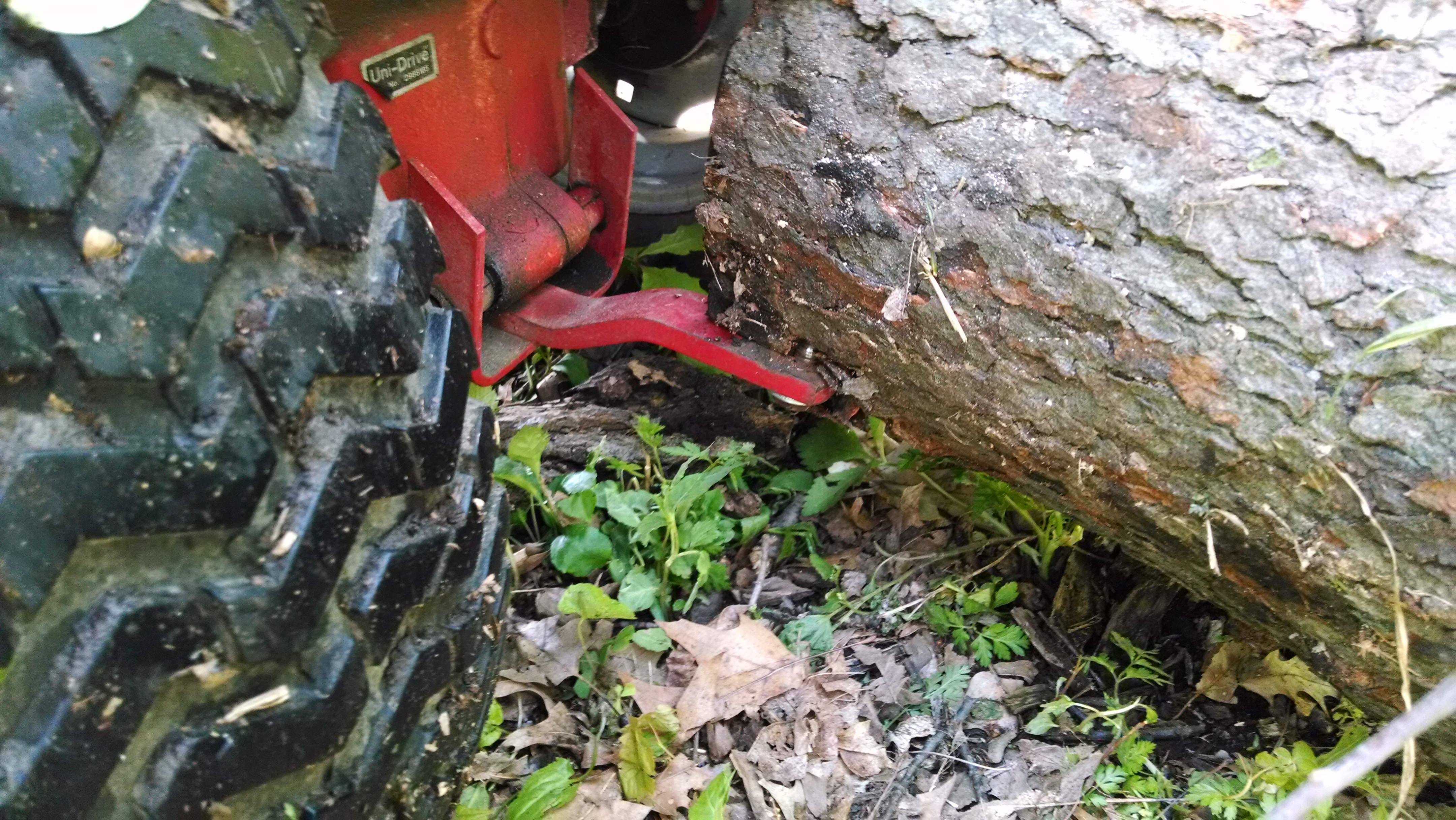 I was able to pull the first and lightest log by attaching it directly to the tongue of the lawnmower